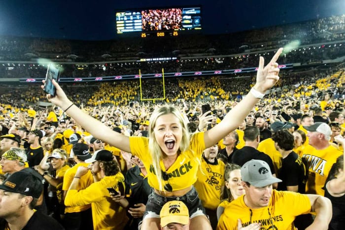 Iowa fans celebrate their team's 23-20 win over Penn State at Kinnick Stadium. (Joseph Cress/Iowa City Press-Citizen)